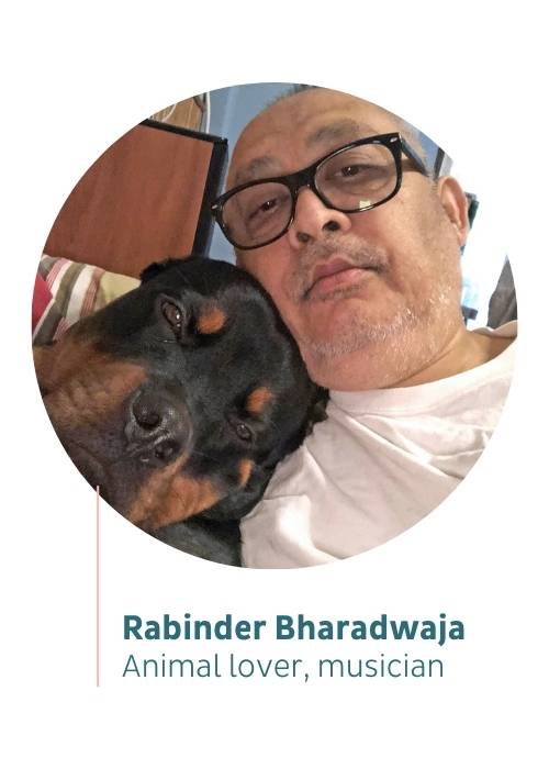 Person next to a dog, text reads: Rabinder Bharadwaja, animal lover, musician